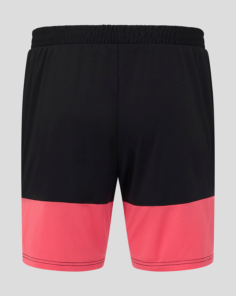 Black and pink shorts on a gray background