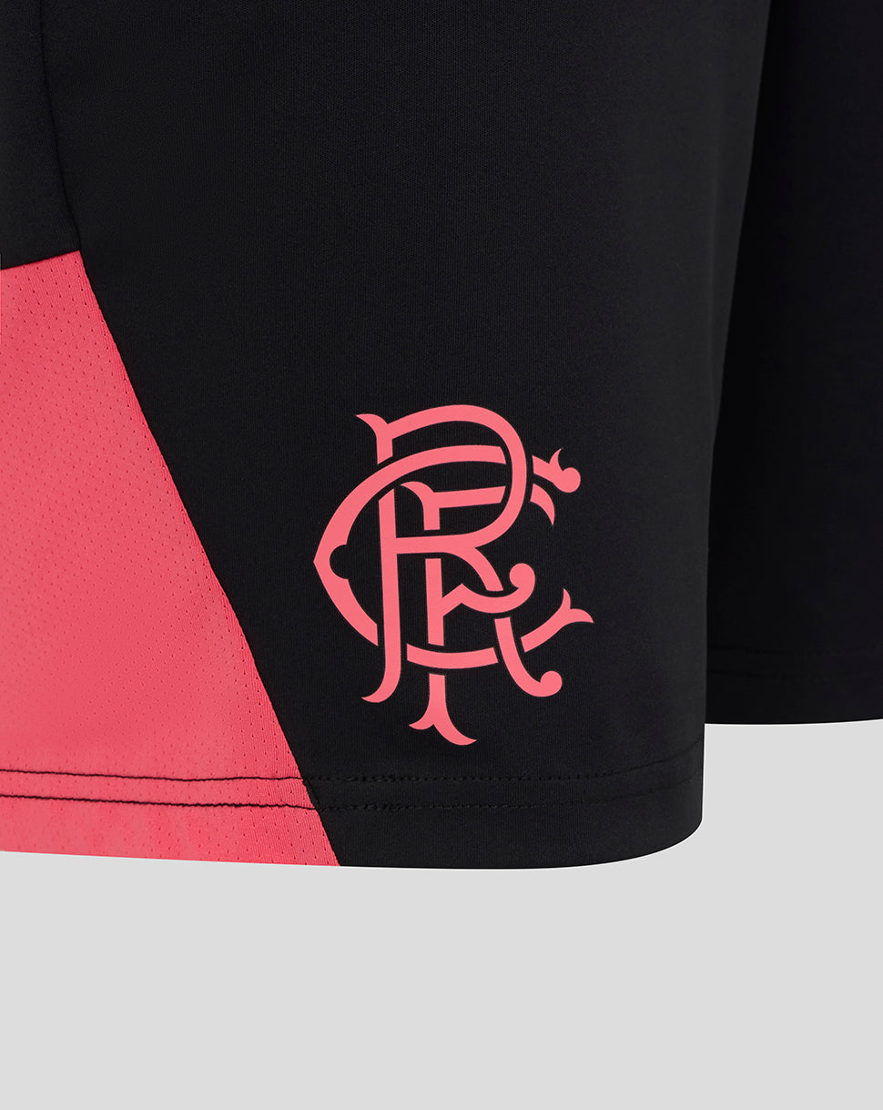 Black and pink sports shorts with a logo on a light gray background