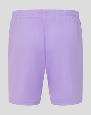 Light purple athletic shorts with an elastic waistband, shown from the back on a solid light gray background.