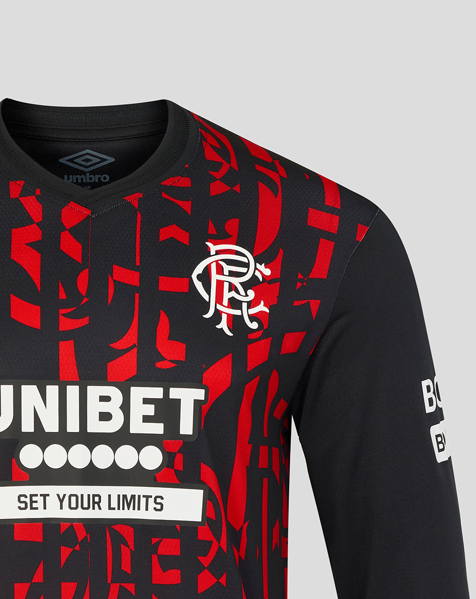 Close-up of a black and red patterned long-sleeve soccer jersey with a white Flamengo crest on the chest, UNIBET sponsor text, and Umbro logo inside the collar, shown against a light gray background.