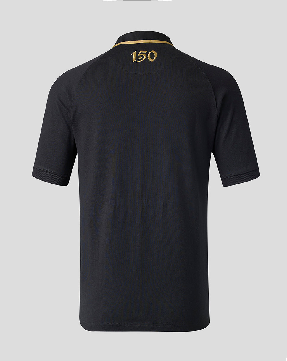 A black short-sleeve polo shirt shown from the back, featuring a gold embroidered collar stripe and the number '150' in gold near the top center.