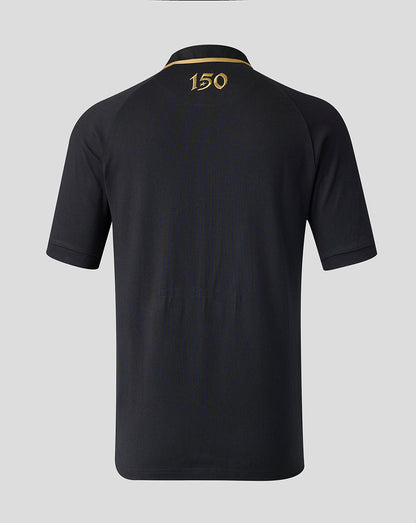 A black short-sleeve polo shirt shown from the back, featuring a gold embroidered collar stripe and the number '150' in gold near the top center.