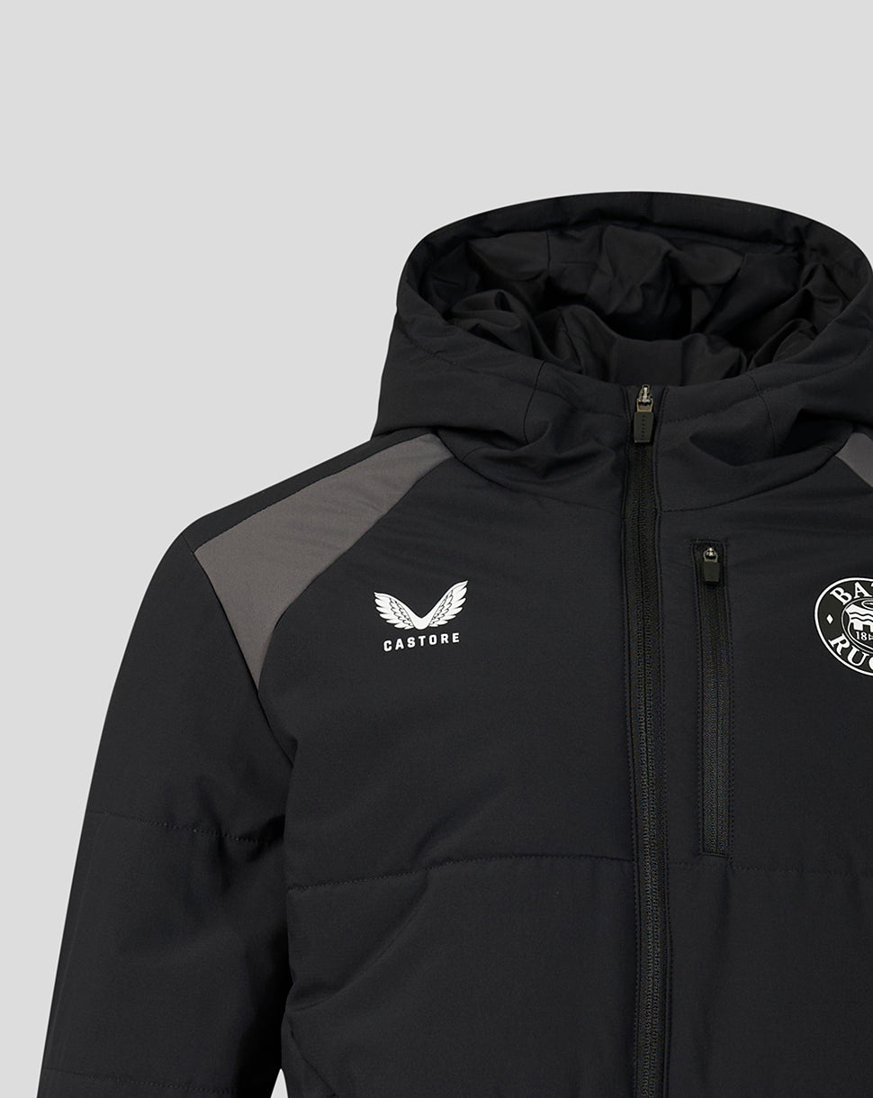 A close-up of a black hooded puffer jacket with gray shoulder panels, featuring a white Castore wing logo on the left chest and a circular crest on the right chest, set against a solid light gray background.