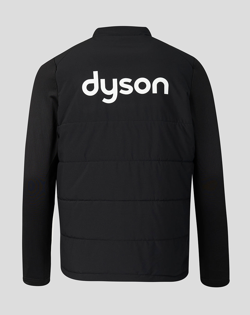 Black long-sleeve puffer jacket with a white 'dyson' logo printed across the upper back, shown on a solid light gray background.