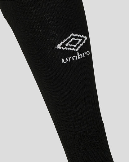 Black sock with Umbro logo on a light gray background