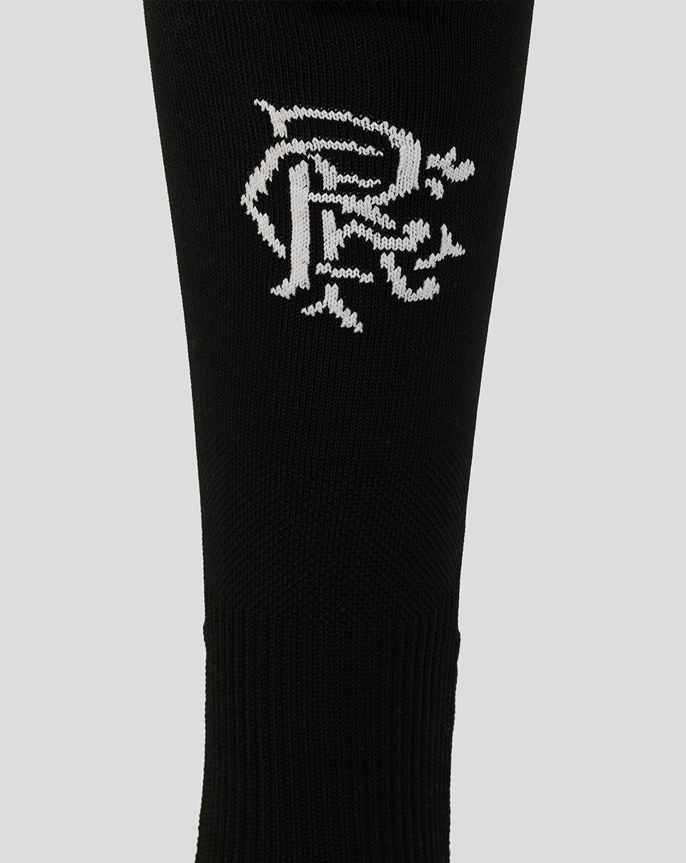 Black sock with a white logo on a light gray background