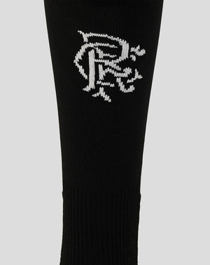 Black sock with a white logo on a light gray background