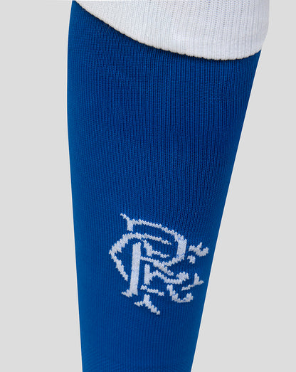 Close up of blue Rangers FC sock showing white cuff and white club emblem on the calf