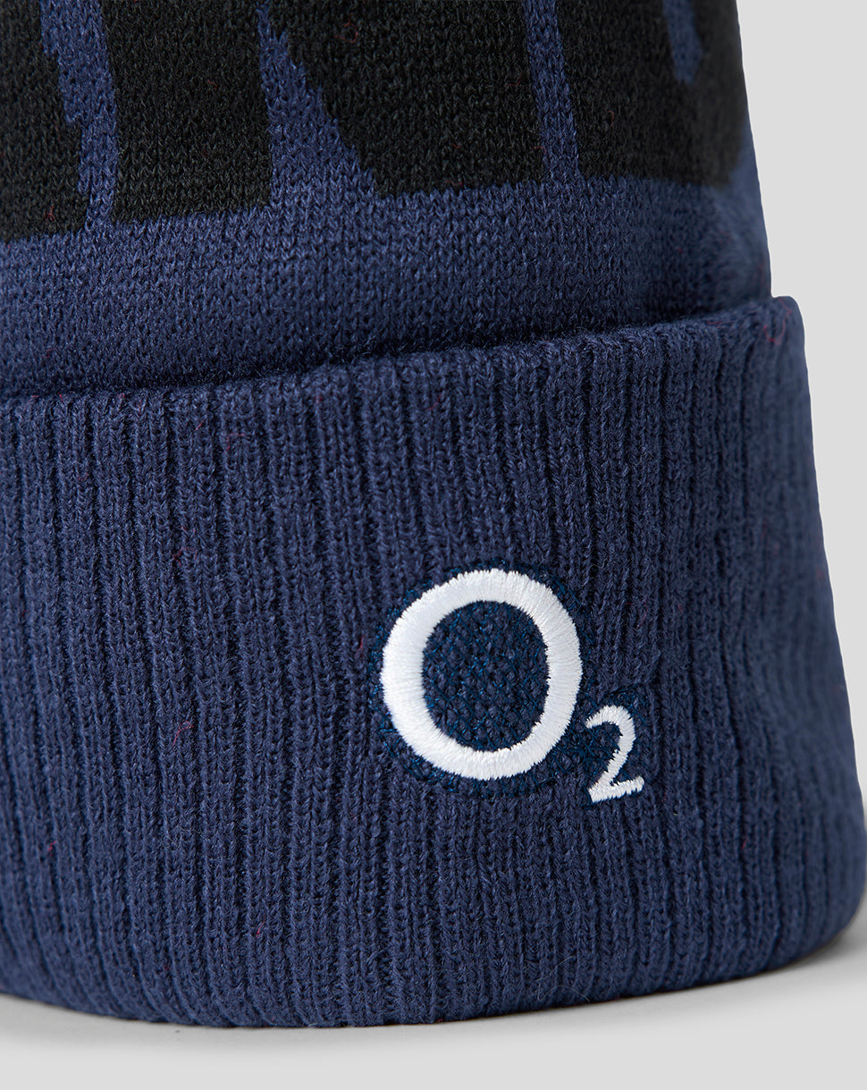Navy blue beanie with 'O2' logo on a light gray background