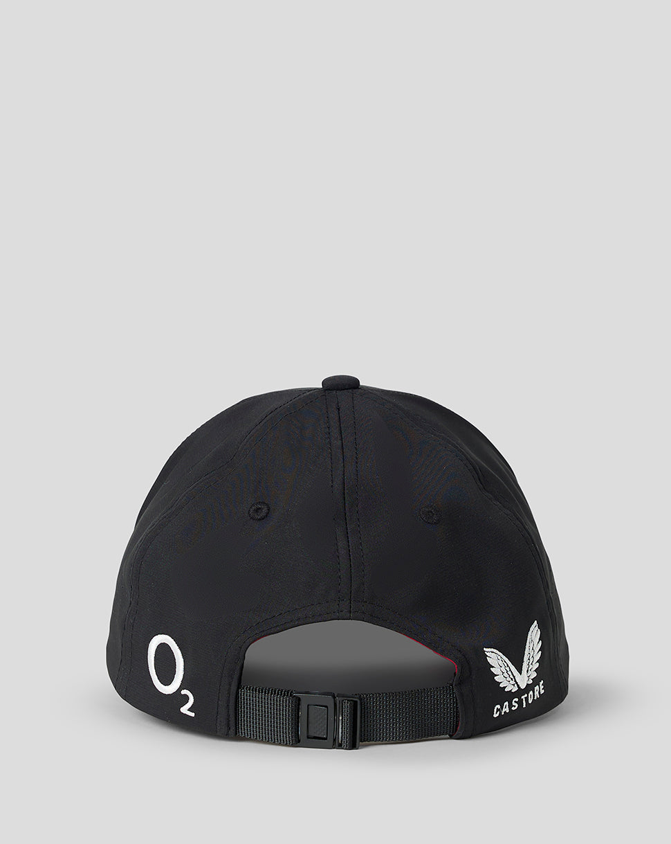 Black cap with branding on a gray background