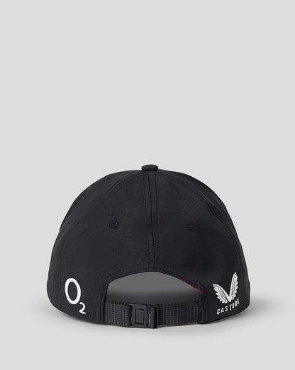 Black cap with branding on a gray background