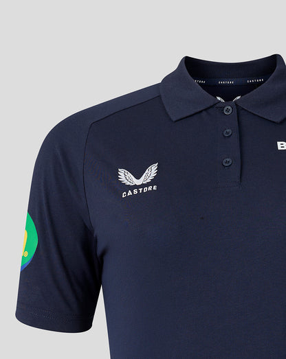 Close up of navy polo collar with three buttons and Castore branding at the neck.