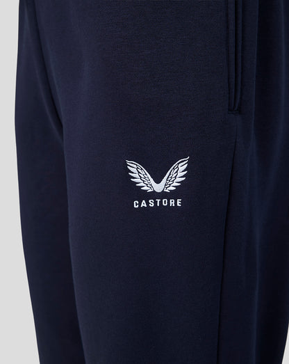 Navy travel joggers with white Castore wing logo embroidered on the thigh