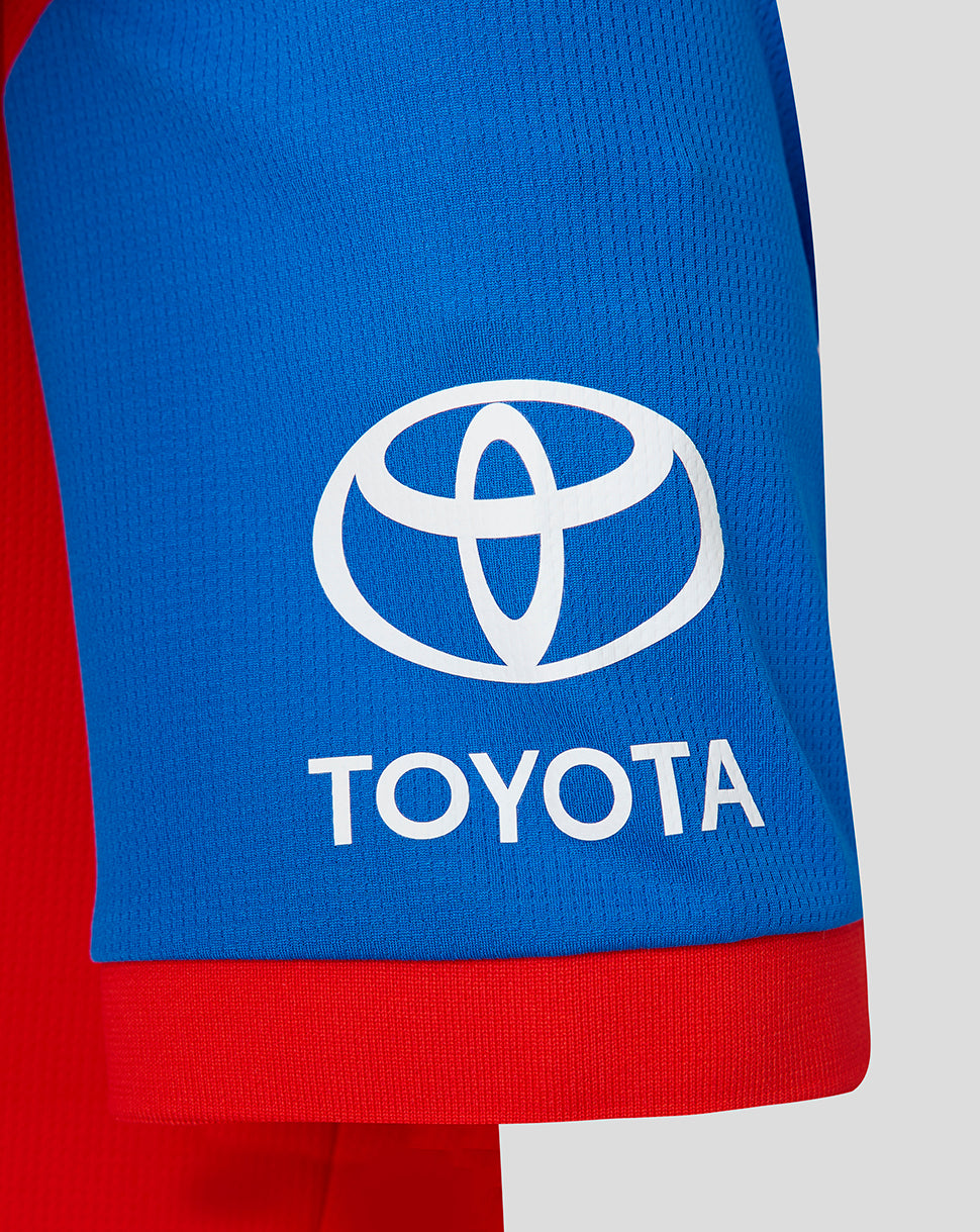 Close-up of a blue and red sports jersey with Toyota logo