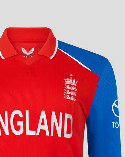 Close up of England women's World Cup replica shirt with crest and large ENGLAND lettering on a red torso and blue sleeve