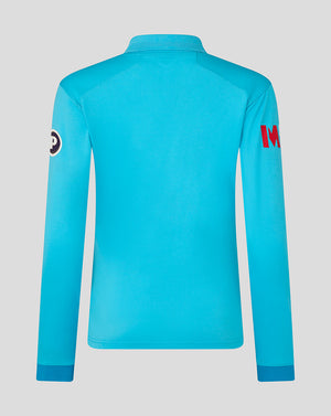 Blue long-sleeve shirt with branding on a gray background