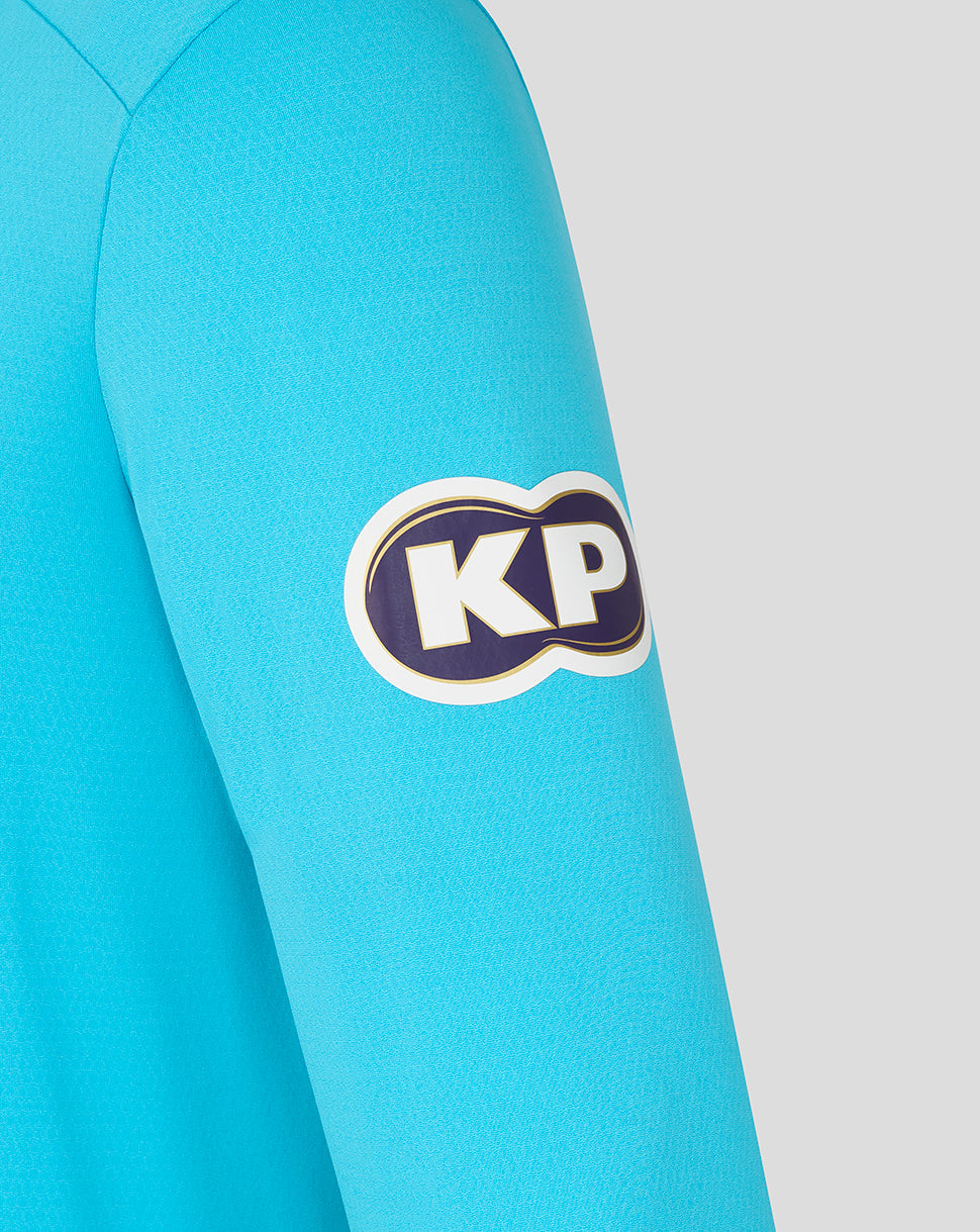 Close-up of a turquoise sleeve with a 'KP' logo on a light gray background