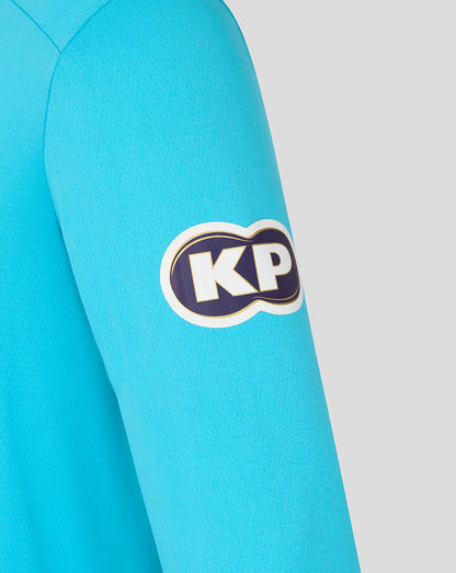 Close-up of a turquoise sleeve with a 'KP' logo on a light gray background