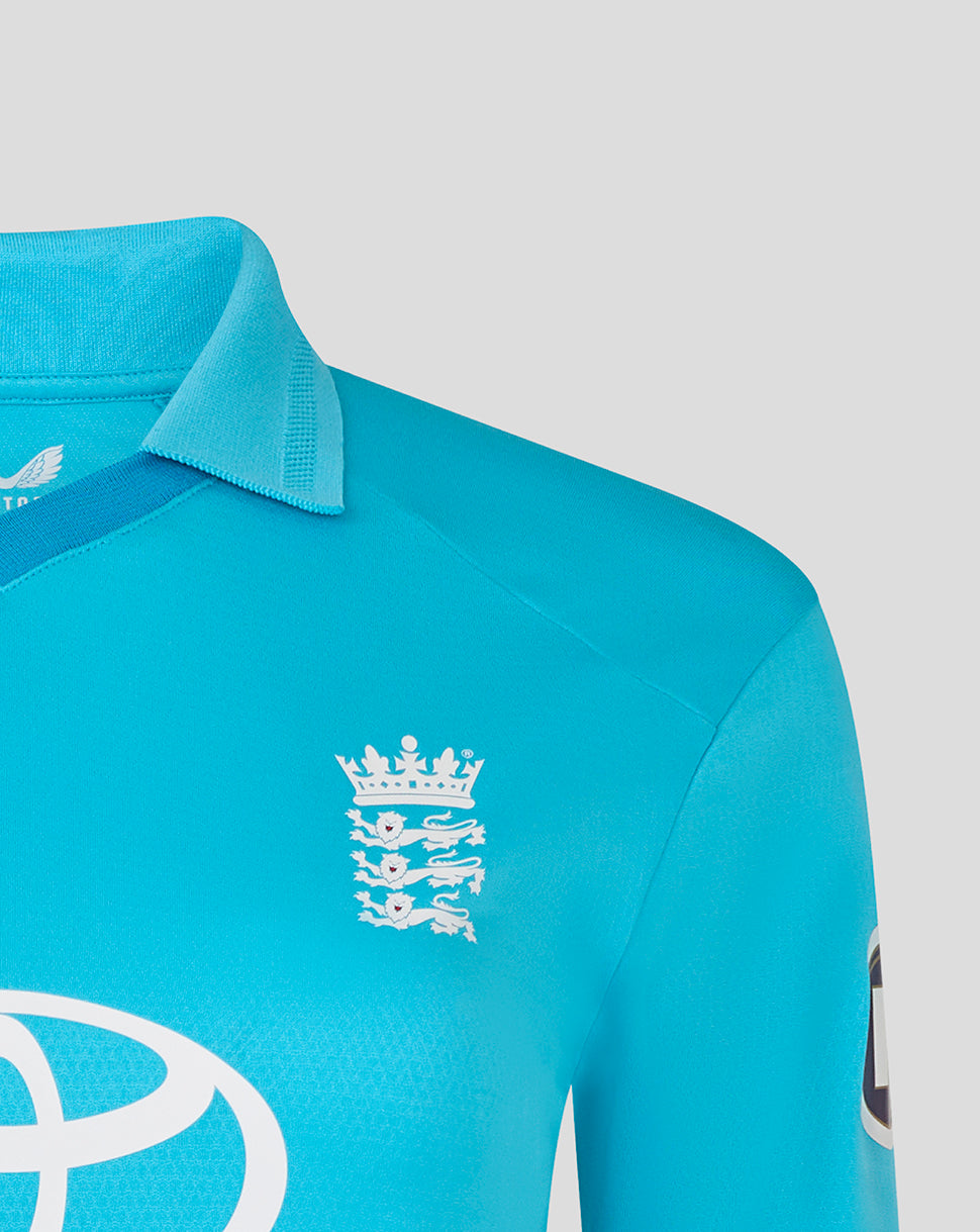 Close-up of a blue sports jersey with a logo on a light gray background