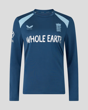 Blue long-sleeve shirt with 'Whole Earth' text and cricket logo on a gray background