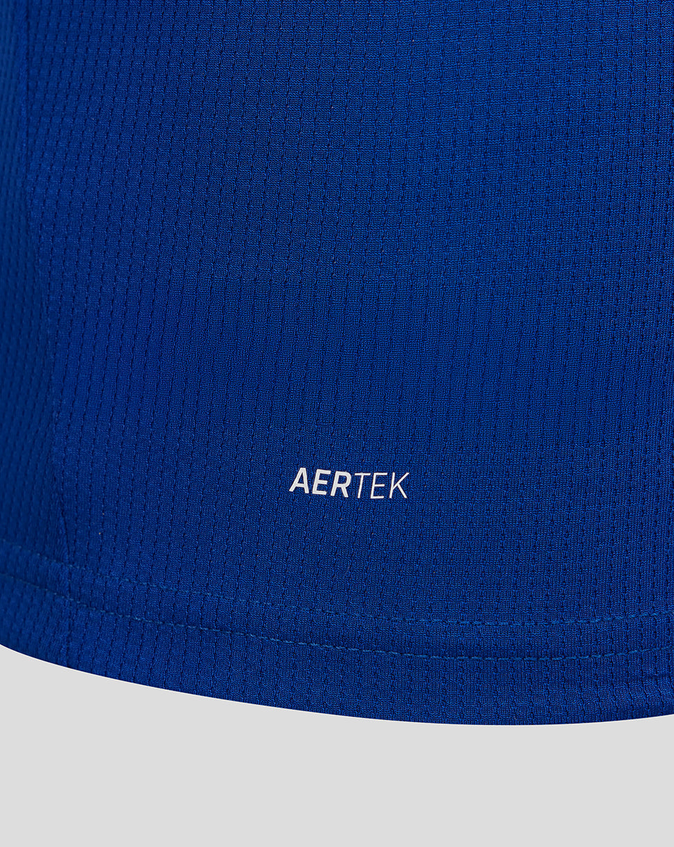 Close-up of a blue garment with 'AERTEK' branding on a white background