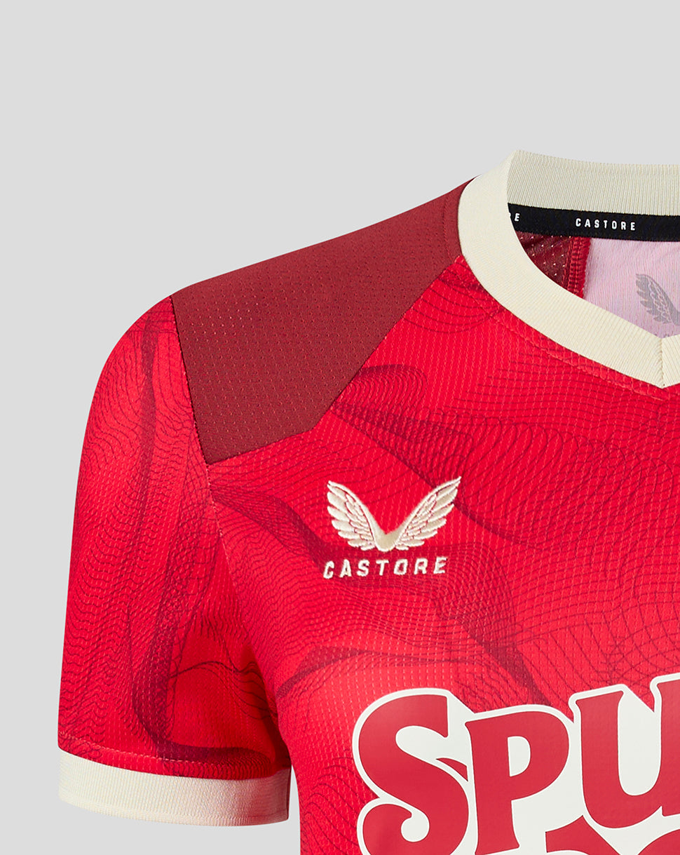 Preston North End women's 26/27 third shirt in Rococco Red with cream collar and textured contour pattern.