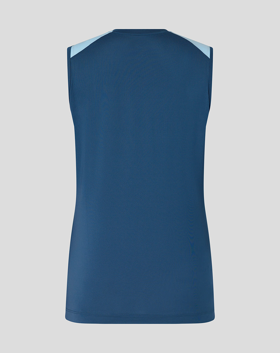 Blue sleeveless shirt on a gray background