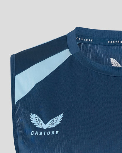 Blue athletic shirt with Castore logo on a light gray background