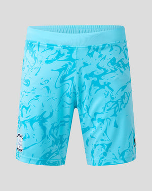 Blue patterned shorts on a gray background