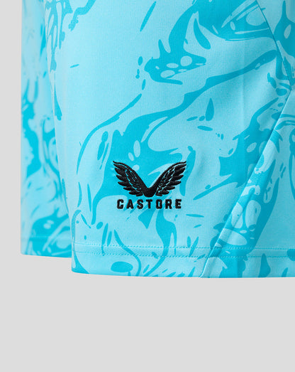 Blue patterned shorts with a visible brand logo on a light gray background