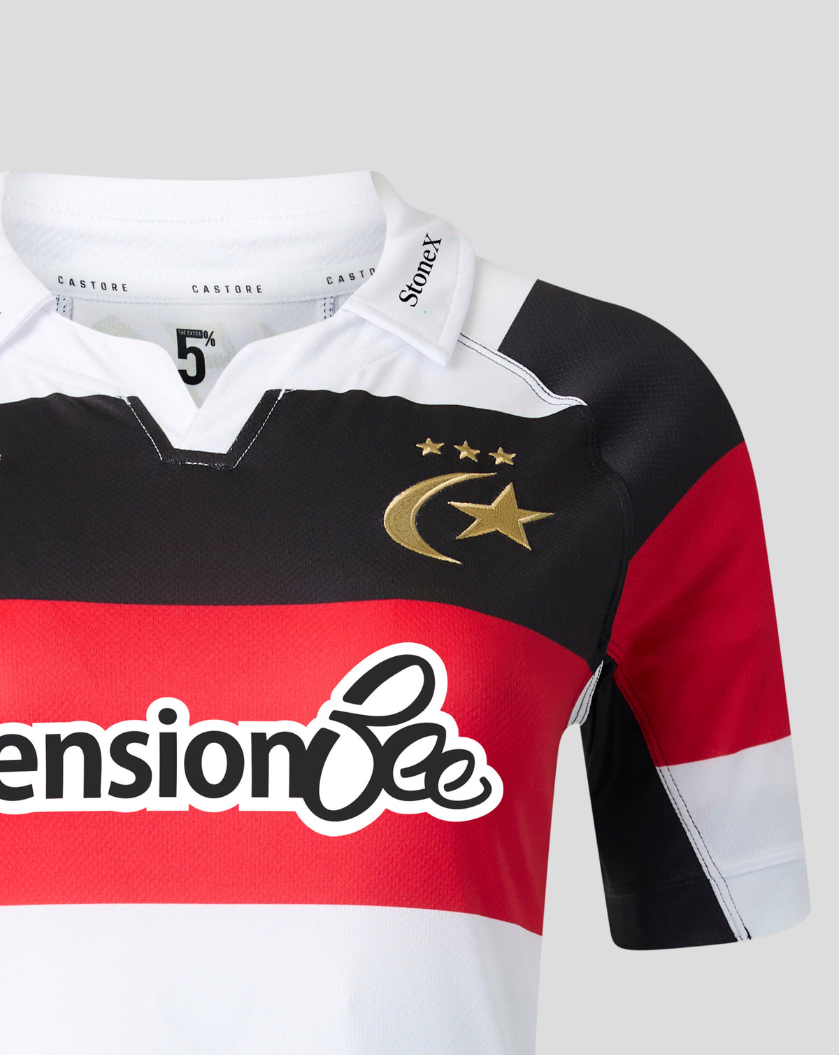 A close-up of a short-sleeve sports jersey with horizontal black, red, and white stripes, featuring a gold crescent and star logo with three stars on the chest. The sponsor 'Pension Bee' is printed across the red stripe, and the brand 'Stinetz' is visible on the collar.