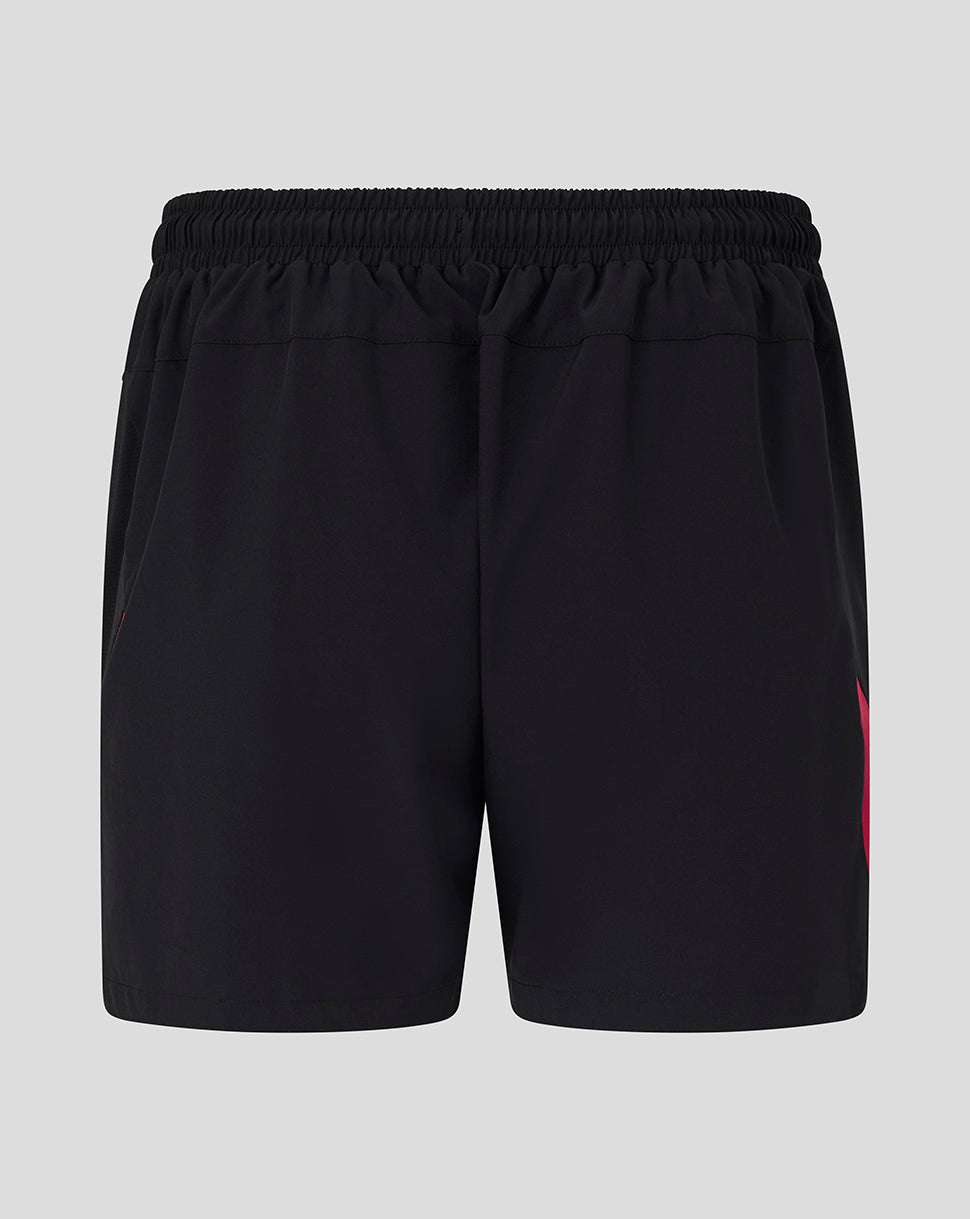 Black shorts with a red logo on a light gray background