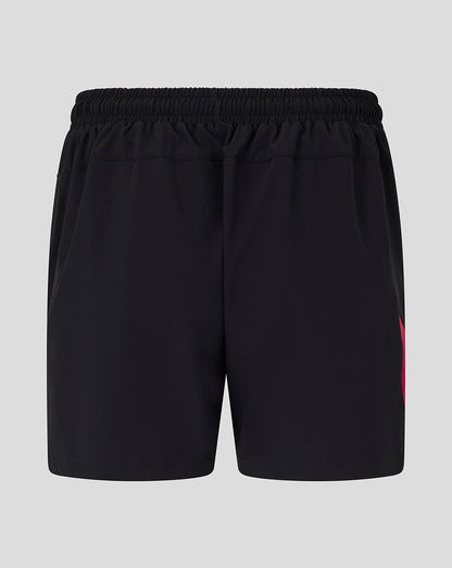 Black shorts with a red logo on a light gray background