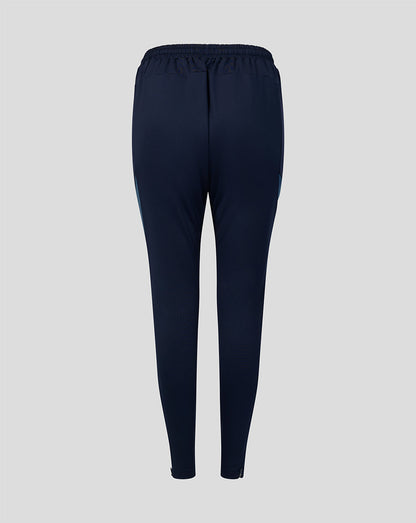 Back view of navy Harlequins training pants with elastic waistband and tapered legs