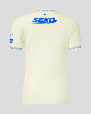 Beige sports jersey with 'SEKO' branding on a gray background