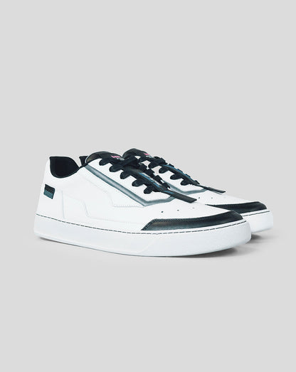 White BWT Alpine Endstate sneaker with black toe caps and laces on a gray background