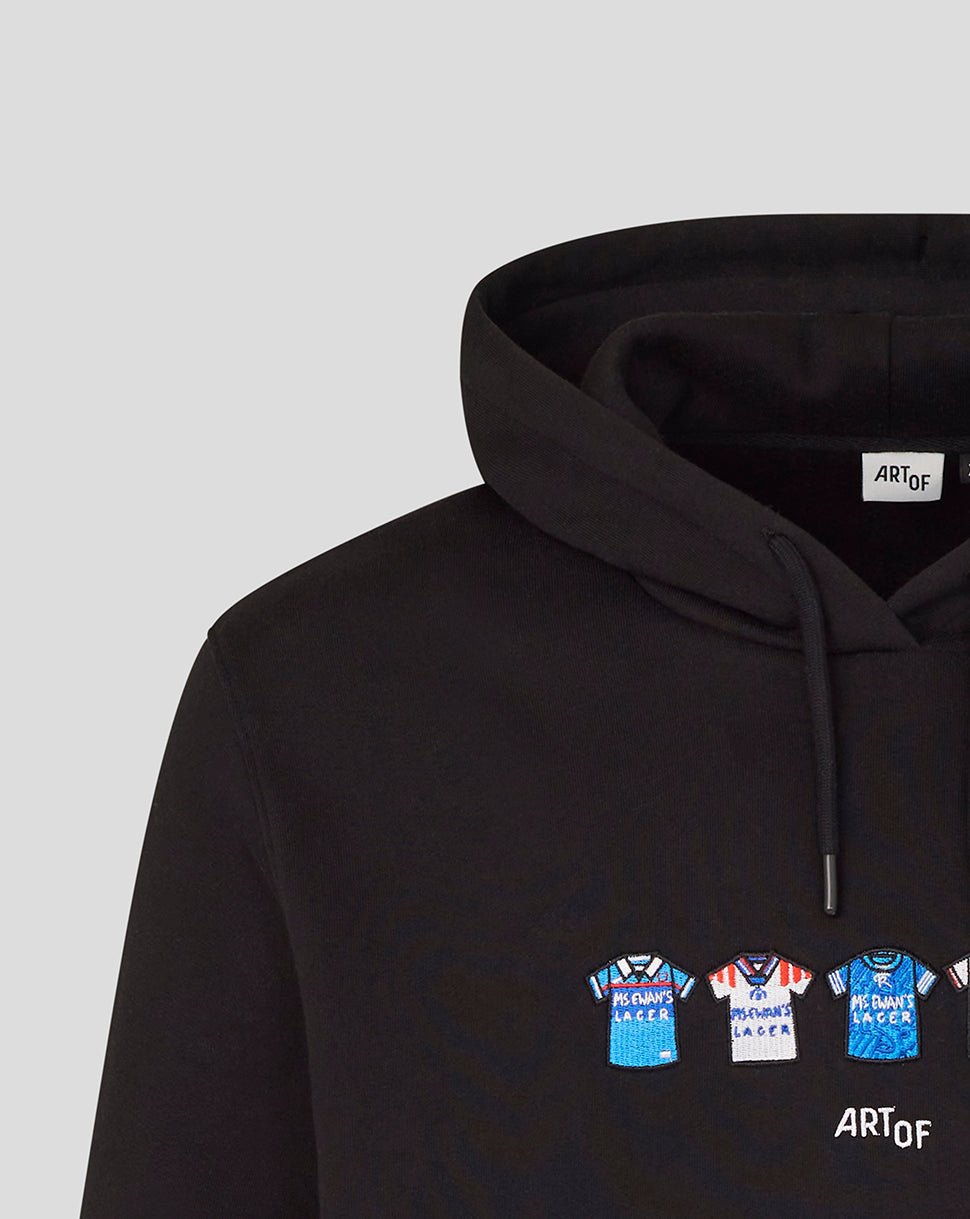 Detail of the black hoodie with colorful jersey icons across the chest and ART OF branding visible on the front