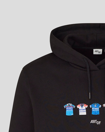 Detail of the black hoodie with colorful jersey icons across the chest and ART OF branding visible on the front