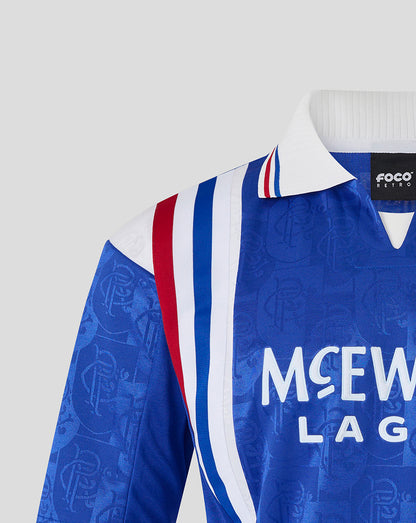 Close up of blue Rangers retro 1996-97 home shirt shoulder area with red white and blue stripes and white collar.