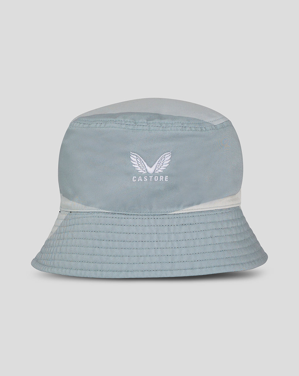 Light blue reversible bucket hat with white Castore wings logo.