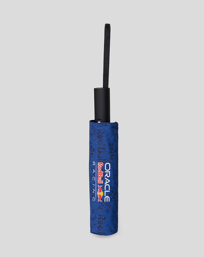 Blue folded Oracle Red Bull Racing umbrella with black handle and wrist strap