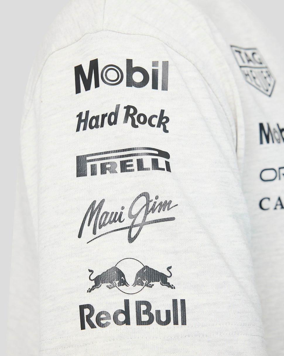 White jacket with various logos including Mobil, Hard Rock, Pirelli, Maui Jim, and Red Bull on a light gray background.