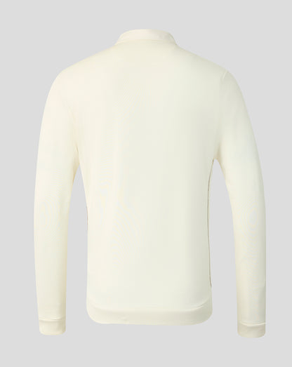 A long-sleeve knit top shown from the back, in a solid cream or off-white color, displayed on a neutral light gray background.