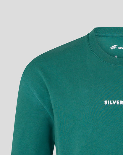 Close-up of a teal green long-sleeve crewneck sweatshirt with white 'SILVER' text printed on the chest, set against a light gray background.