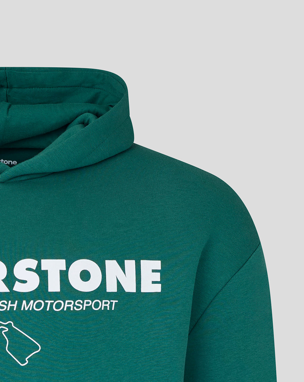 Close-up of a dark teal green hoodie featuring a white 'SILVERSTONE' and 'BRITISH MOTORSPORT' graphic on the chest, set against a light gray background.