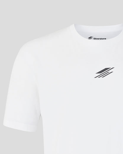 A close-up of a white short-sleeve crewneck t-shirt by Silverstone, featuring a small black logo on the left chest and the brand name printed inside the collar.