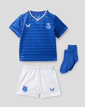 Everton FC baby home kit featuring blue zigzag jersey white shorts and blue socks