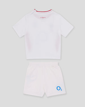 Back view of baby England Rugby home kit white top with red neck trim and matching shorts featuring the O2 logo
