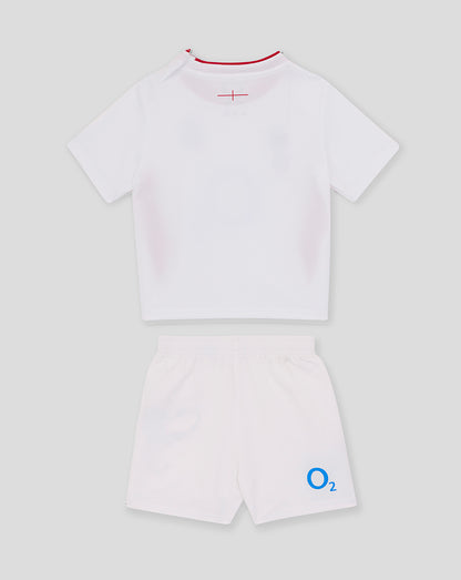 Back view of baby England Rugby home kit white top with red neck trim and matching shorts featuring the O2 logo