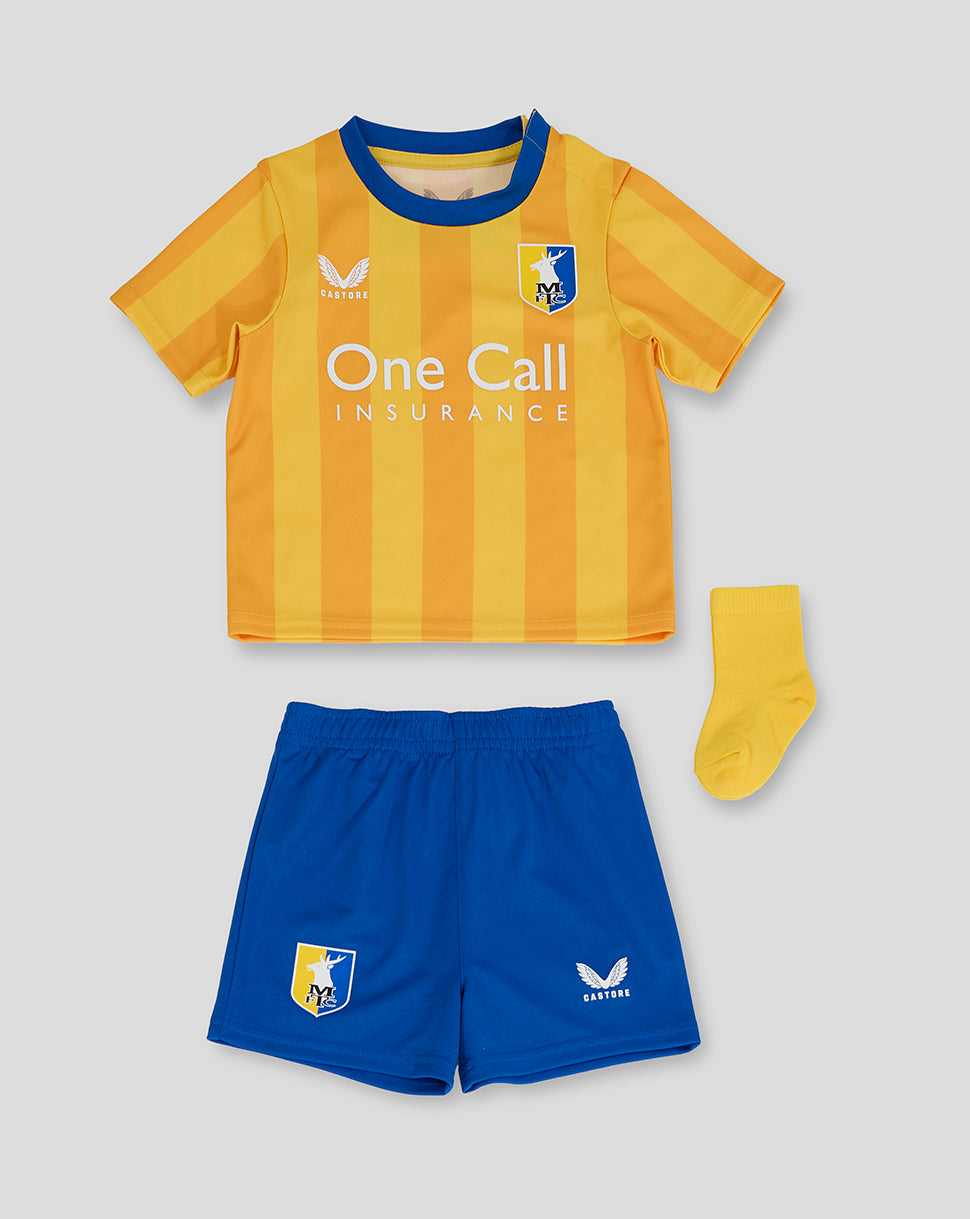 Mansfield 24/25 home baby kit laid out with a yellow striped jersey blue shorts and a matching yellow sock.